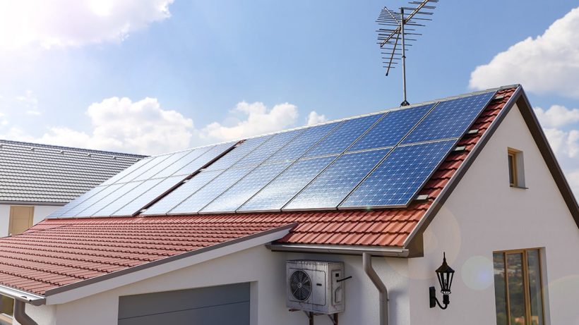 House with solar panels and an antenna.