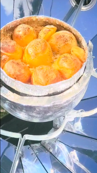 Baked goods cooking in a solar oven.